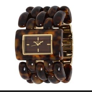 Michael Kors Brown Tortoise Women's Watch(battery working)very good condition.